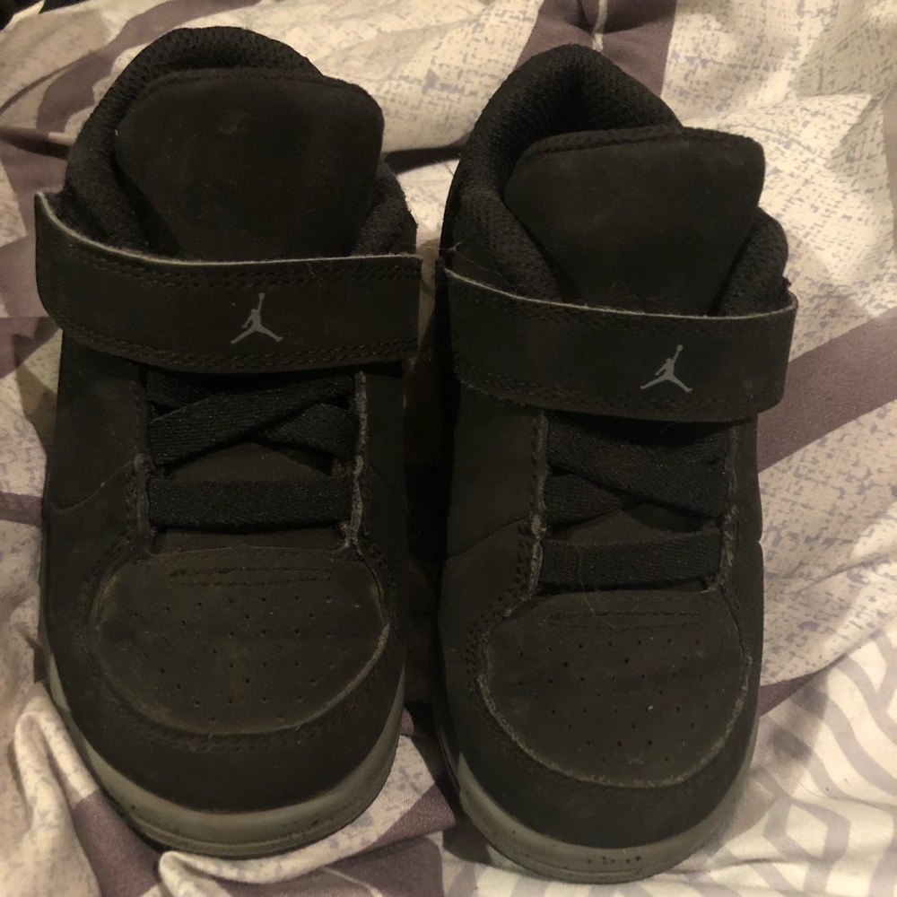 2 pairs of Nike Jordan’s size 7C & 8C.